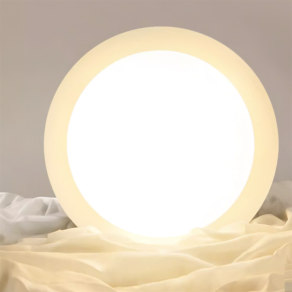 Plafoniera rotonda a LED - Bagliore naturale ed eleganza discreta