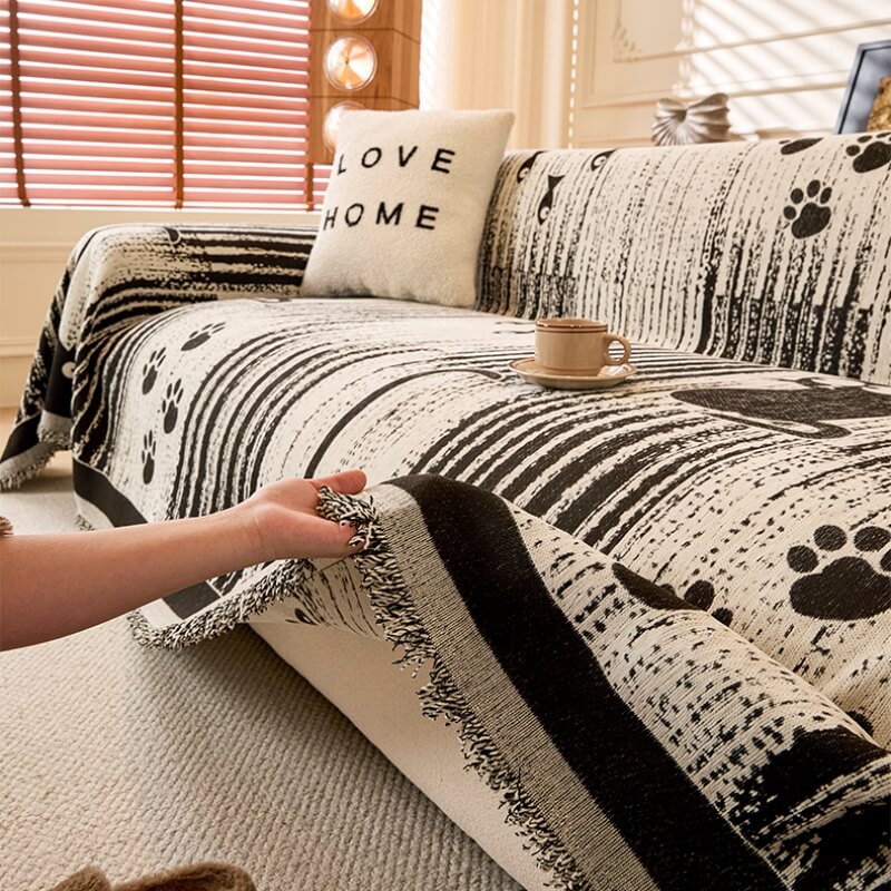 Non-slip Sofa Cover with Paw Print Pattern – Protection and Comfort 